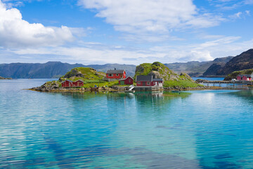 Wall Mural - Fishing village with traditional red rorbu at Trollholmen island, Mageroya, Norway