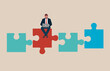 © Vadym - Businessman is sitting on a piece of a puzzle. Business concept. Flat modern vector illustration