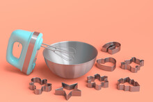Metal Bowl With Electric Mixer And Cookie Cutters On Coral Background