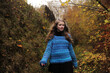 © Kirsty Larmour/Stocksy - A girl in a blue knitted jumper hiking in winter