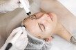 © Demetr White/Stocksy - Woman wearing medicine hat in clinic