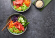 © Darren Muir/Stocksy - Salmon poke bowls