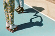 © Erin Brant/Stocksy - Rollerskates and shadows