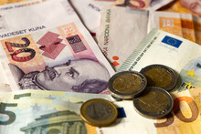 Croatia Joins The Eurozone..Croatian Banknotes And European Banknotes (Kuna And Euro).