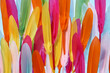 © Yaroslav Danylchenko/Stocksy - Bright multicolored feather pile, full frame.