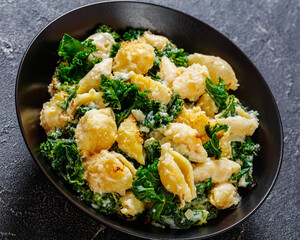 Sticker - cheesy baked pasta with green leafy kale