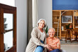 © ALTO IMAGES/Stocksy - Cheerful elderly couple in light living room
