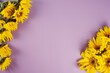 Beautiful sunflowers bouquet on a violet background.