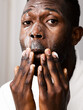 © ohlamour studio/Stocksy - Man with refreshing face wash on his face