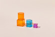 © Yaroslav Danylchenko/Stocksy - Glass geometric shapes with color shadow.