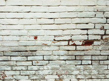 Cracked Rusty White Brick Wall With A Hole Texture, Background.