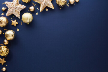Wall Mural - Stylish Blue Christmas background with gold stars, balls, confetti. Elegant Christmas greeting card, banner, party invitation card template.