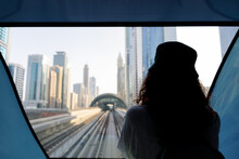 A Woman In The Metro In Dubai