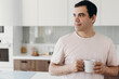 © Stereo Shot/Stocksy - Calm Hispanic man with coffee at home