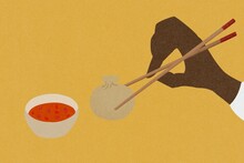 Chinese dumpling and chopsticks