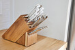 © Trinette Reed/Stocksy - Knife set in kitchen