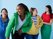 © Leire Cavia/Stocksy - Group Of Diverse Models walking Together
