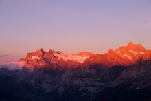 Wetterhorn And Schreckhorn Mountain Peaks At Sunset