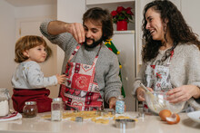 Baby Having Fun Baking With Her Parents