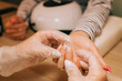 © Olga Moreira/Stocksy - Nails in the middle of nail extention process