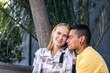 © Pedro Merino/Stocksy - Happy stylish couple spending time together outdoors in the city