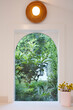 © Trinette Reed/Stocksy - Window in modern cottage