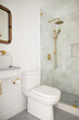 © Trinette Reed/Stocksy - Modern design bathroom shower in farmhouse