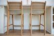 © Trinette Reed/Stocksy - Wicker bar stools