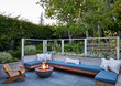 © Trinette Reed/Stocksy - Outdoor patio in courtyard of cottage home