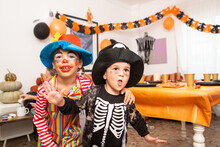 Two Kids At Halloween Party In Fancy Dress