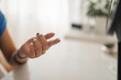 © Lupe Rodríguez/Stocksy - contact lens on the finger of a teenage girl