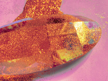 Crystal Prism Rolled Into Vibrant Golden Glitter.