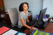 © Lightsy/Stocksy - Woman working on a computer