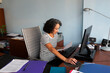 © Lightsy/Stocksy - Businesswoman working with files