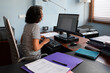 © Lightsy/Stocksy - Lawyer working in a messy office