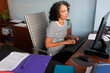 © Lightsy/Stocksy - Businesswoman working with a computer