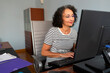 © Lightsy/Stocksy - Woman working on a computer