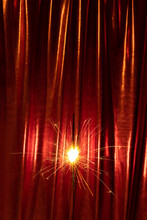 Sprinkler On The Red Curtain With Yellow Shine. 