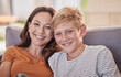© Alexis S/peopleimages.com - Love, family and portrait of mother and child on a sofa, happy and smile while bonding, embrace and laughing together. Mom, son and happy family moment in a lounge, enjoying quality time in Amsterdam