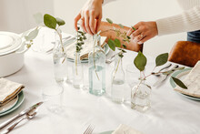 Holiday Table-setting With Simple Eucalyptus Arrangement