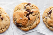 © Kelly Knox/Stocksy - freshly baked chocolate chip cookies