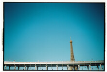 Abstract Paris Architecture With Tip Of Eiffel Tower Bridge Bir-Hakeim