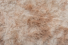Background Concept Of Fur Texture Top View. Brown Fur Background. Fur Pattern. Texture Of Brown Shaggy Fur. Wool Texture. Fluffy Sheepskin. Background Fur Pattern Concept.