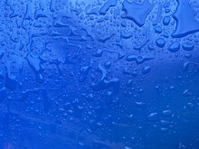 Raindrops On Blue Container