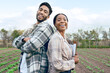 © J Maas/peopleimages.com - Man, woman farmer or agriculture with checklist, farm and plants in portrait with smile. Couple, green crops and farming teamwork for vegetable, fruit or sustainability with happiness on agro field