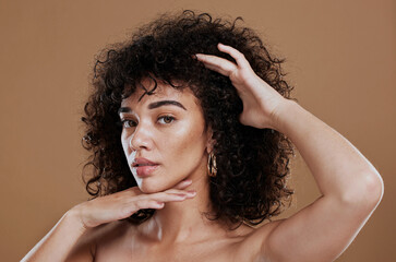 Wall Mural - face, skincare and hair with a model black woman in studio on a brown background for natural keratin