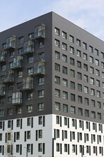 New Building Facade In Housing Complex "Green Park. PIK", Moscow City, Russia. Modern Style In Architecture. Contemporary House In Dormitory Area. Urban Landmark, Home. Black Facade Of Building