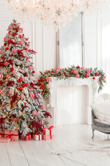 Wall Mural - Christmas background, pine branches festive background. Creative composition with border and copy space. Christmas decoration with bokeh lights from light bulbs