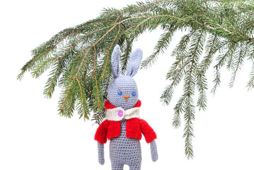 Canvas Print - Knitted rabbit under the tree.