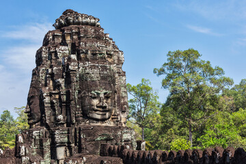 Fototapete - Ancient stone face of Bayon temple, Angkor, Cambodia